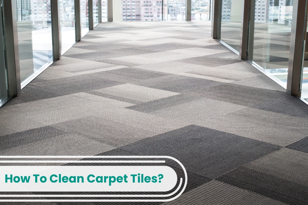 A hallway with carpet tiles showing signs of wear and tear that could benefit from regular cleaning to maintain its lifespan.